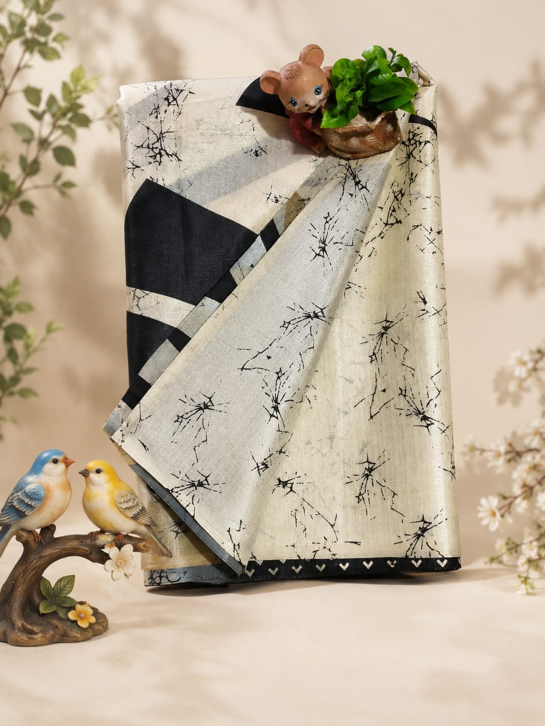 Cream/beige baseline paired with bold black, grey, and metallic gold accents